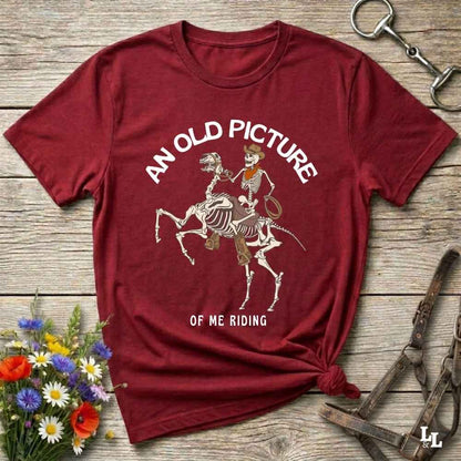 Saddle up with spooky western vibes in this skeleton cowboy “Old Picture of Me Riding” shirt, perfect for rodeo lovers and Halloween humor fans. This cowboy skeleton t-shirt combines retro western style with dark humor, ideal for ranchers, riders, and funny costume alternatives. Make fall fashion unforgettable with this witty, rustic western parody tee featuring bones, boots, and bold cowboy nostalgia.