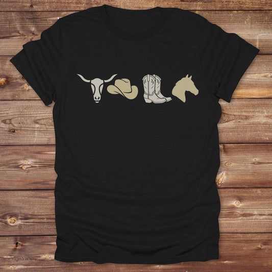 Embrace western vibes with this boho inspired graphic tee, featuring cowboy icons and perfect for horse lovers and rodeo fans. Designed for cowgirls, cowboys, and equestrian souls, Whether you're headed to the rodeo or relaxing at the ranch, this cowboy hat and boots tee adds a bold country aesthetic. Featuring a longhorn skull, cowboy hat, cowboy boots and horse.