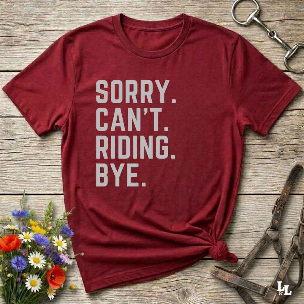 This “Sorry Can’t. Riding. Bye.” western typography tee is the perfect gift for horse lovers, trail riders, and anyone living the cowboy or cowgirl lifestyle. Made from premium Gildan 64000 cotton, it's unisex and available in 8 colors to match your cowboy core aesthetic. Whether you're off to a rodeo, riding horses, or just showing off your rustic humor, this bold minimalist horse quote shirt delivers personality and comfort. Great for birthdays, western lovers, and equestrian fashion fans.