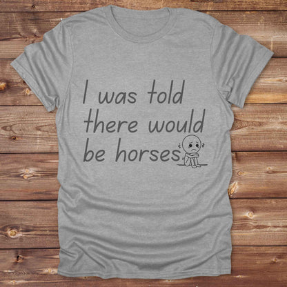 "I Was Told There Would Be Horses” t-shirt blends western humor with country sarcasm, making it a perfect gift for horse lovers, cowboys, and cowgirls alike. It features a bold quote and a sad cartoon face, adding personality and rustic charm to your cowboy core wardrobe. Whether you're headed to a rodeo, riding event, country fair, or just living that barn life, this shirt brings the laughs and the style. It’s a great birthday gift, rodeo tee, or daily wear.
