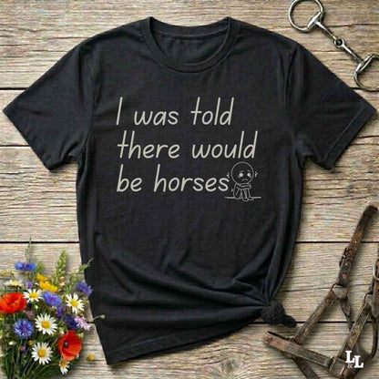 "I Was Told There Would Be Horses” t-shirt blends western humor with country sarcasm, making it a perfect gift for horse lovers, cowboys, and cowgirls alike. It features a bold quote and a sad cartoon face, adding personality and rustic charm to your cowboy core wardrobe. Whether you're headed to a rodeo, riding event, country fair, or just living that barn life, this shirt brings the laughs and the style. It’s a great birthday gift, rodeo tee, or daily wear.