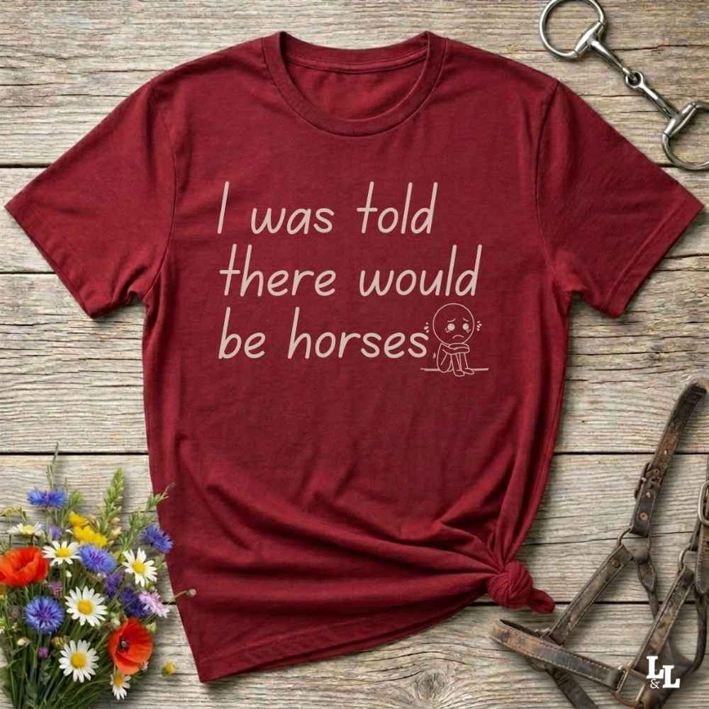 "I Was Told There Would Be Horses” t-shirt blends western humor with country sarcasm, making it a perfect gift for horse lovers, cowboys, and cowgirls alike. It features a bold quote and a sad cartoon face, adding personality and rustic charm to your cowboy core wardrobe. Whether you're headed to a rodeo, riding event, country fair, or just living that barn life, this shirt brings the laughs and the style. It’s a great birthday gift, rodeo tee, or daily wear.