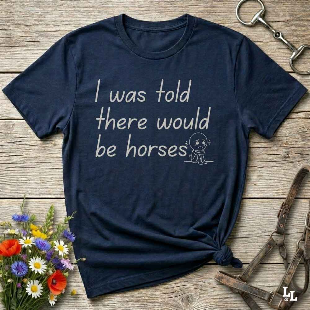 "I Was Told There Would Be Horses” t-shirt blends western humor with country sarcasm, making it a perfect gift for horse lovers, cowboys, and cowgirls alike. It features a bold quote and a sad cartoon face, adding personality and rustic charm to your cowboy core wardrobe. Whether you're headed to a rodeo, riding event, country fair, or just living that barn life, this shirt brings the laughs and the style. It’s a great birthday gift, rodeo tee, or daily wear.