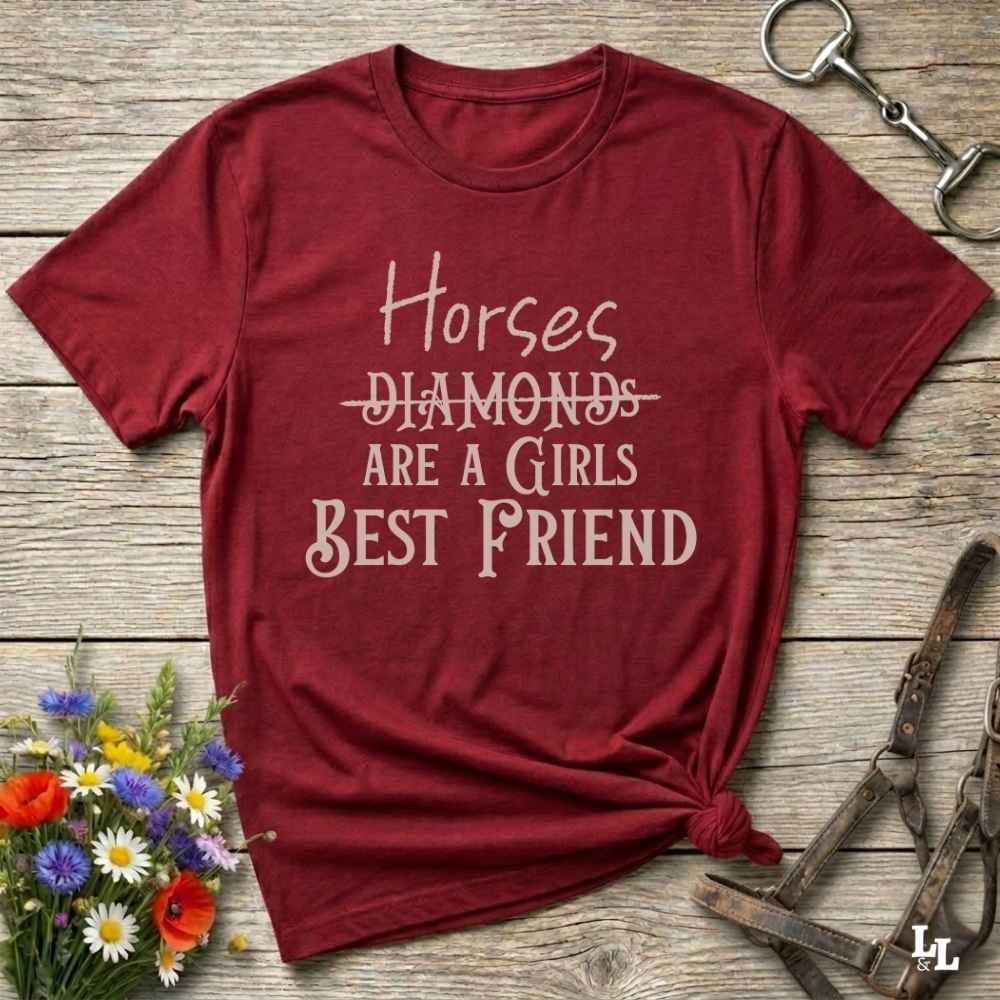 Horses Are a Girl’s Best Friend” red tee from Lasso and Loom is the perfect blend of sass and saddle ready style. Featuring a rustic hand lettered graphic with the word Diamonds cheekily crossed out, this cowgirl shirt celebrates equestrian passion in the most fashionable way. Ideal as a gift for horse lovers, western girls, and rural soul sisters. Whether you're trail riding, shopping small, or posting from the paddock, this shirt says what every horse girl already knows, diamonds don’t ride.