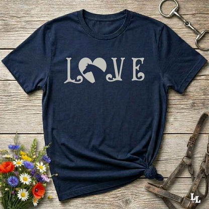This Love Horses navy blue T-Shirt is the perfect expression of passion for horse lovers and cowgirls alike. With a unique heart-and-horse silhouette design and rustic western typography, it makes a thoughtful gift for birthdays, rodeo lovers, equestrians, and country women who live the cowboy lifestyle. The tee pairs well with denim, boots, and a bold cowgirl spirit. Whether for barn days, trail rides, or everyday western fashion, this shirt belongs in your rodeo ready wardrobe.