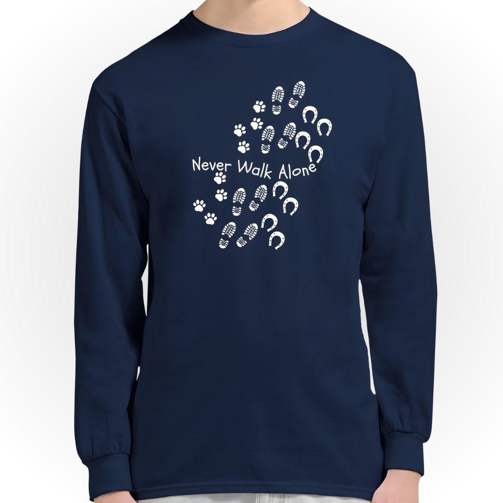 Navy blue long-sleeve shirt with paw print design and 'Never Walk Alone' text on a white background. Never Walk Alone Long Sleeve Tee for Horse Lovers, Equestrian Apparel, Trail Riding Tee