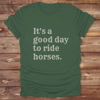 “It’s a Good Day to Ride Horses” t-shirt. Designed for horse lovers, cowgirls, cowboys, and rodeo fans, this rustic tee is a perfect fit for barn life, trail rides, and daily adventures. C. Top selling graphic tee captures the heart of equestrian style and country freedom. Ideal as a birthday gift, casual statement piece, or rodeo outfit, this tee is a must have for saddle up days and western quotes that ride with meaning. Loved by riders, designed for style.