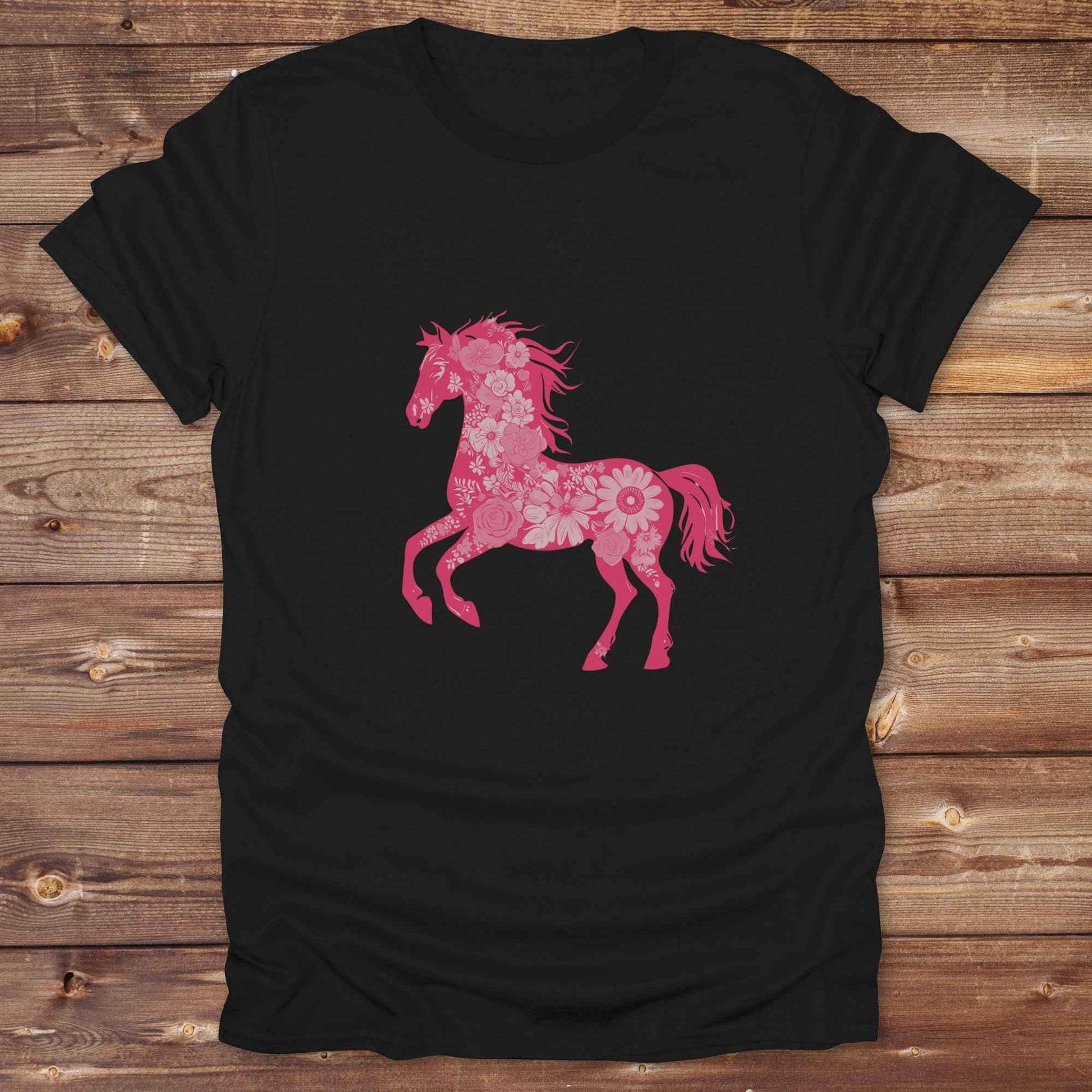 This Boho Flower Horse T-Shirt blends rustic western style with soft feminine charm, featuring a bold silhouette of a galloping mustang filled with intricate floral details. erfect for horse lovers, cowgirls, rodeo fans, and anyone who loves a touch of bohemian elegance in their western wardrobe. Made in 8 beautiful earthy tones, this graphic tee is ideal for birthdays, rodeo days, horse barn adventures, or simply showing off your equestrian spirit in everyday style.  