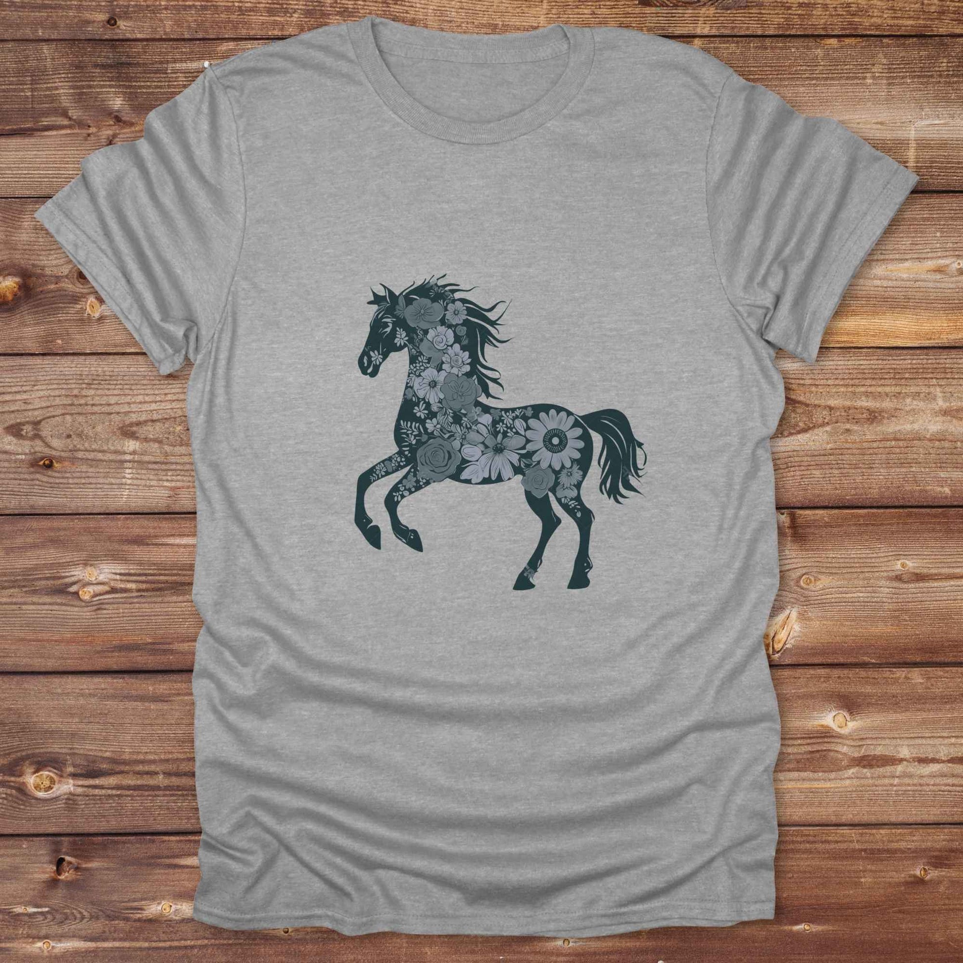 This Boho Flower Horse T-Shirt blends rustic western style with soft feminine charm, featuring a bold silhouette of a galloping mustang filled with intricate floral details. erfect for horse lovers, cowgirls, rodeo fans, and anyone who loves a touch of bohemian elegance in their western wardrobe. Made in 8 beautiful earthy tones, this graphic tee is ideal for birthdays, rodeo days, horse barn adventures, or simply showing off your equestrian spirit in everyday style.  