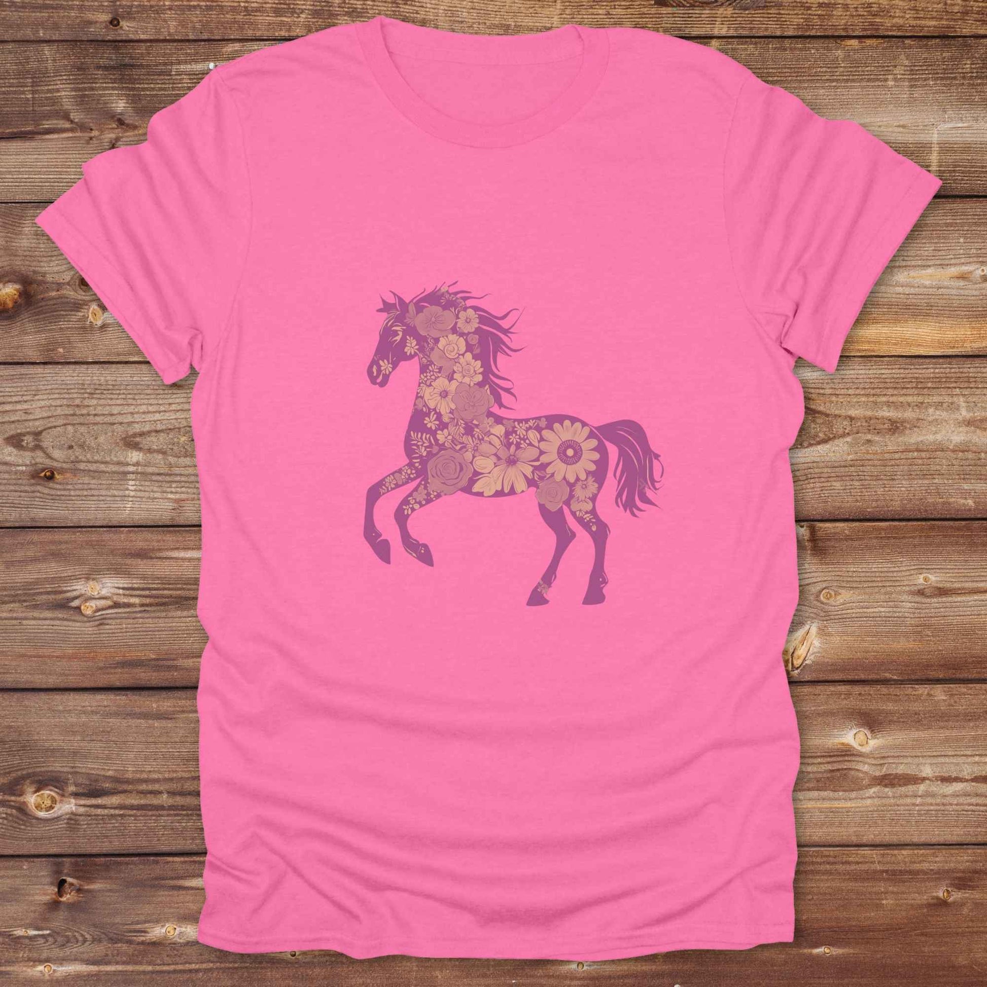 This Boho Flower Horse T-Shirt blends rustic western style with soft feminine charm, featuring a bold silhouette of a galloping mustang filled with intricate floral details. erfect for horse lovers, cowgirls, rodeo fans, and anyone who loves a touch of bohemian elegance in their western wardrobe. Made in 8 beautiful earthy tones, this graphic tee is ideal for birthdays, rodeo days, horse barn adventures, or simply showing off your equestrian spirit in everyday style.  
