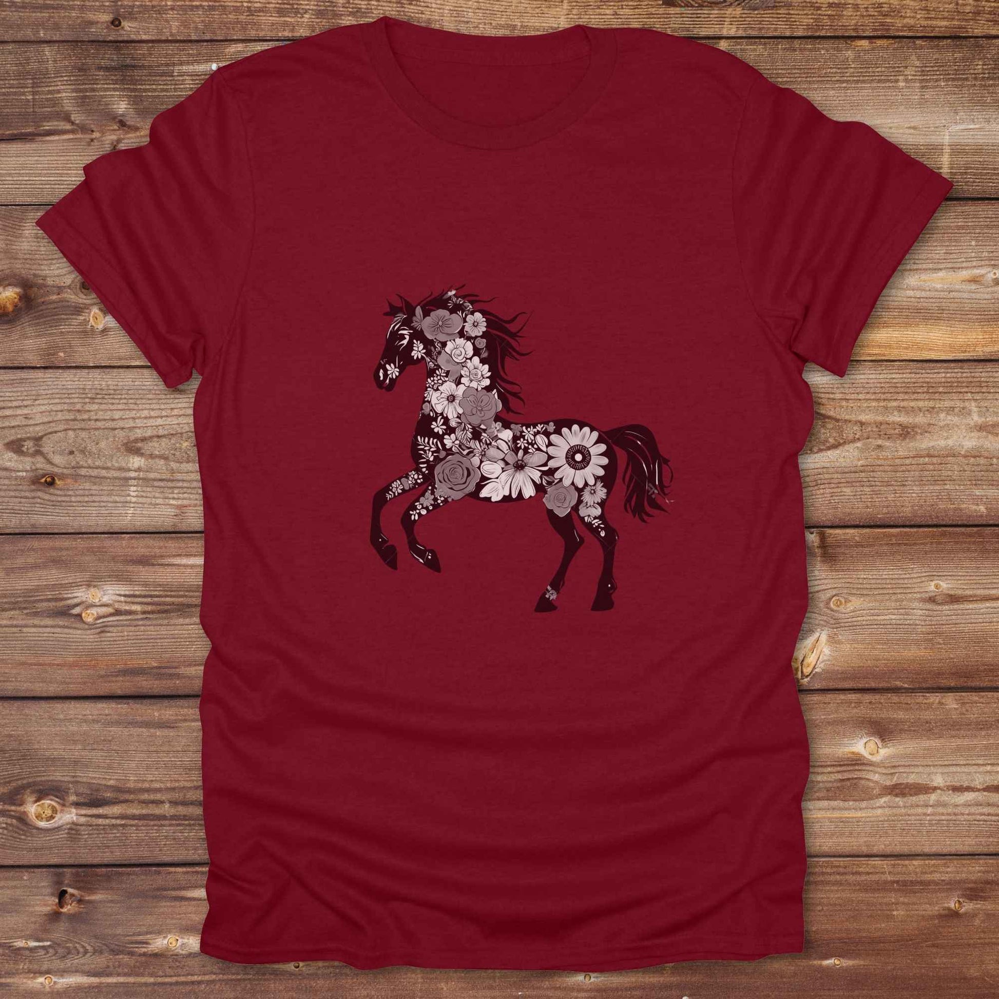 This Boho Flower Horse T-Shirt blends rustic western style with soft feminine charm, featuring a bold silhouette of a galloping mustang filled with intricate floral details. erfect for horse lovers, cowgirls, rodeo fans, and anyone who loves a touch of bohemian elegance in their western wardrobe. Made in 8 beautiful earthy tones, this graphic tee is ideal for birthdays, rodeo days, horse barn adventures, or simply showing off your equestrian spirit in everyday style.  