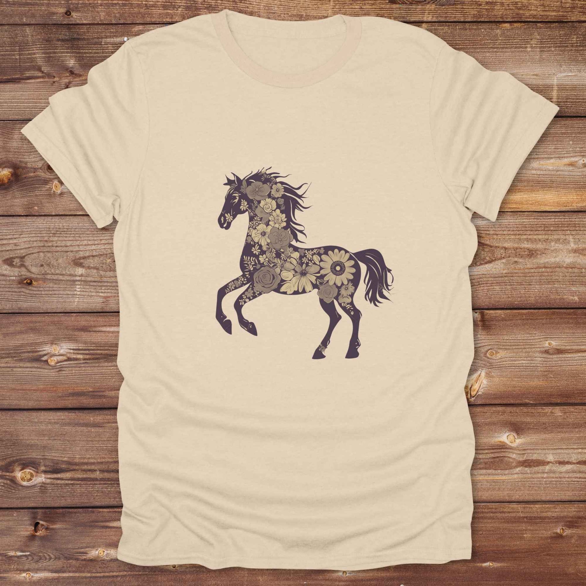 This Boho Flower Horse T-Shirt blends rustic western style with soft feminine charm, featuring a bold silhouette of a galloping mustang filled with intricate floral details. erfect for horse lovers, cowgirls, rodeo fans, and anyone who loves a touch of bohemian elegance in their western wardrobe. Made in 8 beautiful earthy tones, this graphic tee is ideal for birthdays, rodeo days, horse barn adventures, or simply showing off your equestrian spirit in everyday style.  