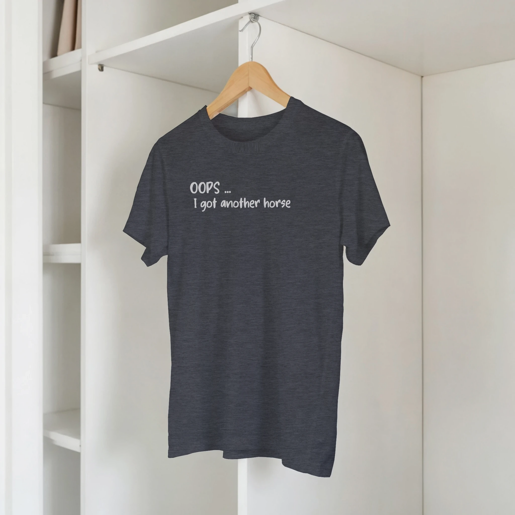 Oops I bought another horse T-Shirt, Funny T-Shirts, Western Style Wear, Cowgirl Shirt for Horse Lover, hanging in cupboard